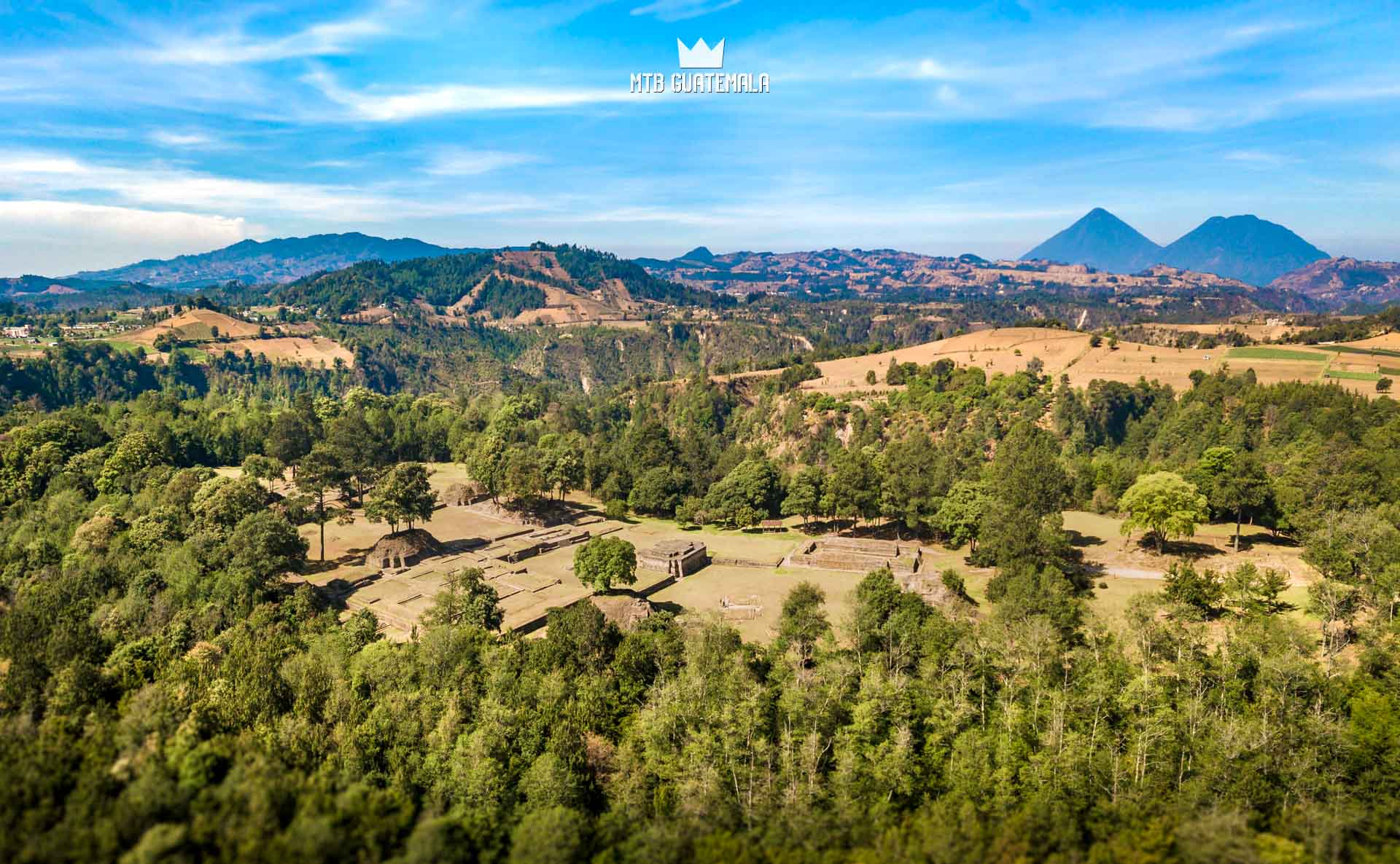 The Mayan Ruinas of Iximché With the volcanoes of Lake Atitlán behind.  , Guatemala
