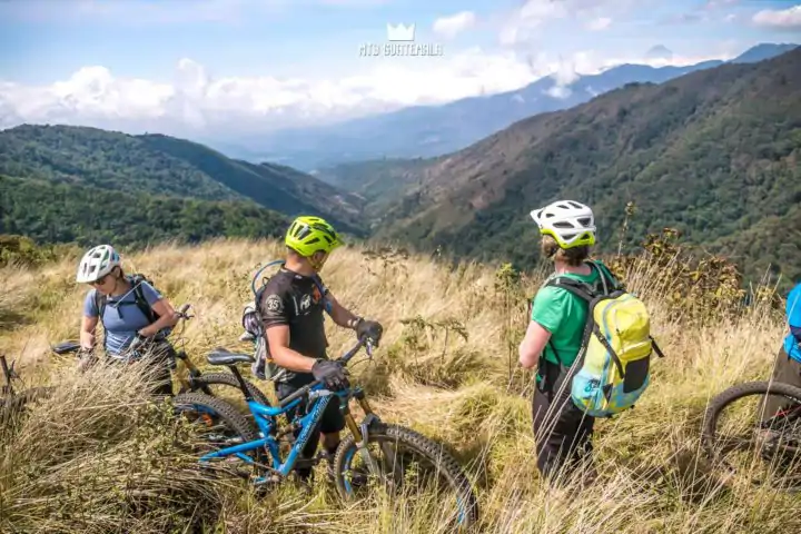 Taking in the views from the alpine plateau - looking west towards the Pacific. Valle Escondido Adventure MTB Tour.  Chimaltenango, Guatemala