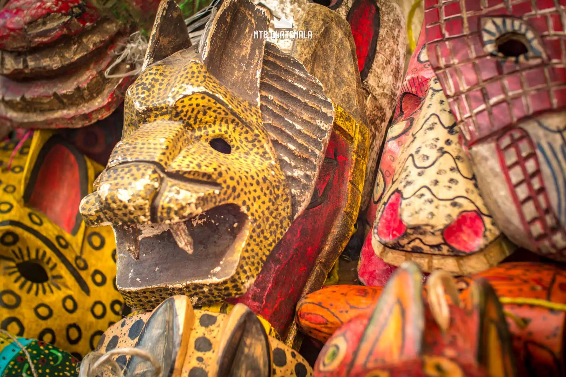 Traditional Mayan masks for sale at the Chichicastenango market.  , Guatemala